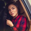 brunette-girl-in-a-car-6AUNV2Y.jpg